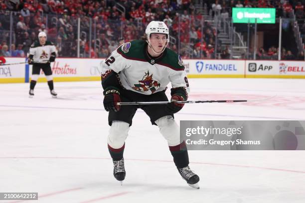 Logan Cooley of the Arizona Coyotes plays against the Detroit Red Wings at Little Caesars Arena on March 14, 2024 in Detroit, Michigan.