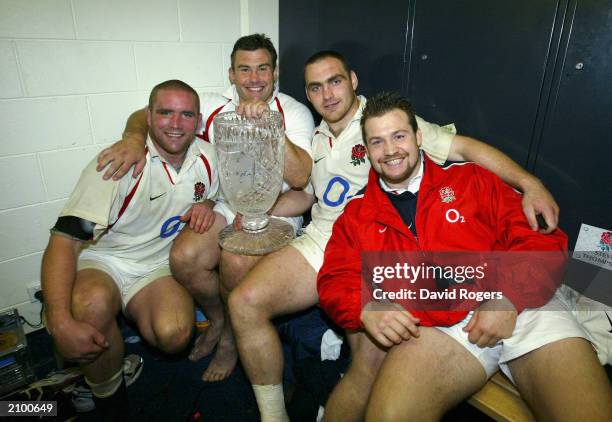 Phil Vickery, Jason Leonard, Trevor Woodman and Mark Regan of England celebrate with the Cook Cup after victory in the Rugby Union Test match between...