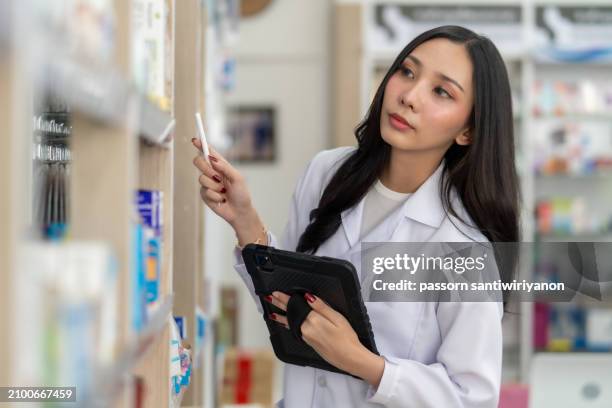 pharmacy counter - pharmaceutical industry stock pictures, royalty-free photos & images