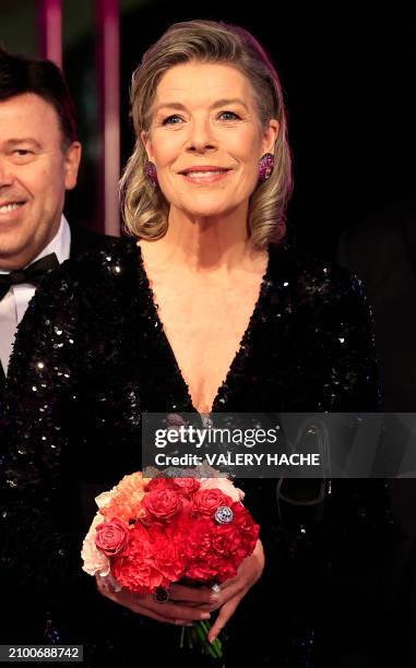 Princess Caroline of Hanover looks on during the "Bal de la Rose" event at the Monte-Carlo Sporting Club in Monaco, on March 23, 2024. Created in...