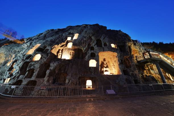 CHN: Tourists Visit Longmen Grottoes In Luoyang