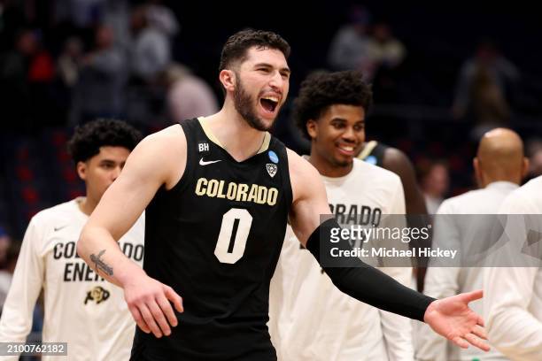 Luke O'Brien of the Colorado Buffaloes celebrates against the Boise State Broncos during the second half in the First Four game of the NCAA Men's...