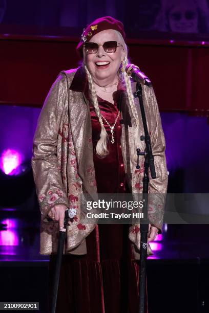 Joni Mitchell performs during the 2024 Gershwin Prize for Popular Song presentation to Elton John and Bernie Taupin by the Library of Congress at DAR...