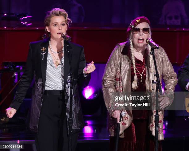 Brandi Carlile and Joni Mitchell perform during the 2024 Gershwin Prize for Popular Song presentation to Elton John and Bernie Taupin by the Library...