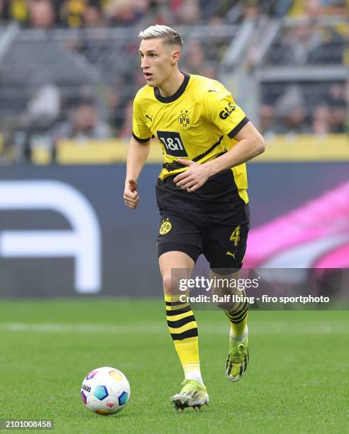 Nico Schlotterbeck of Borussia Dortmund plays the ball during the Bundesliga match between Borussia Dortmund and Eintracht Frankfurt at Signal Iduna...