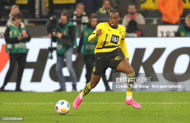 Jamie Bynoe-Gittens of Borussia Dortmund plays the ball during the Bundesliga match between Borussia Dortmund and Eintracht Frankfurt at Signal Iduna...