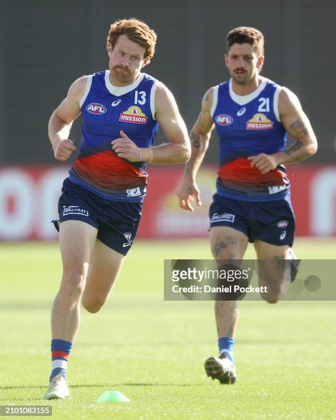 Oskar Baker of the Bulldogs and Tom Liberatore of the Bulldogs ziaduring a Western Bulldogs AFL training session at Whitten Oval on March 20, 2024 in...