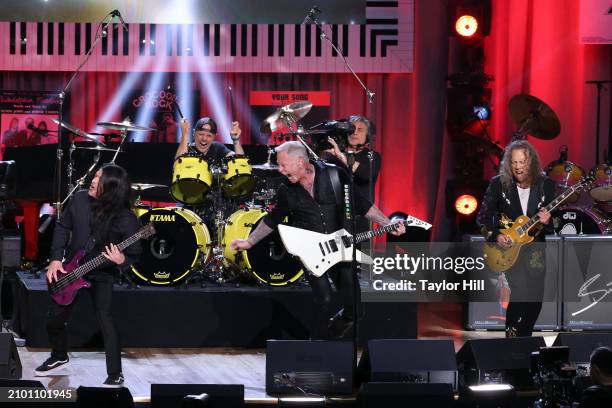 Rob Trujillo, James Hetfield, Lars Ulrich, and Kirk Hammett of Metallica perform during the 2024 Gershwin Prize for Popular Song presentation to...