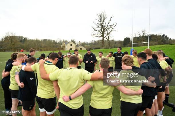 Richard Blaze, Bath Rugby Assistant Coach, speaks to his players as they huddle together during a Bath Rugby training session at Farleigh House on...