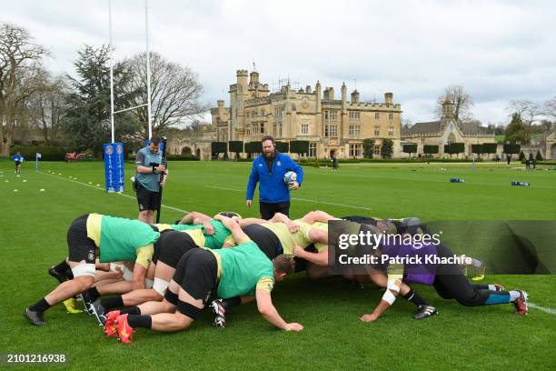 Stevie Scott, Bath Rugby Scrum Coach, looks on as Bath Rugby forwards compete in a scrum during a Bath Rugby training session at Farleigh House on...