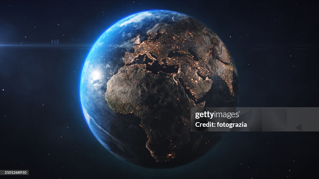 Planet Earth Seen From Space. View of Europe, Asia, & Africa with City Lights at Night