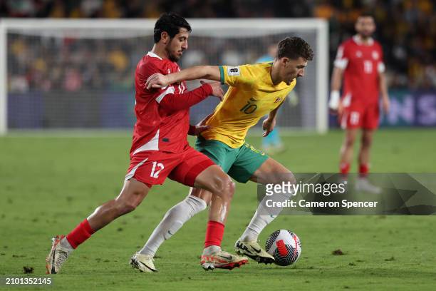 Ajdin Hrustic of Australia and Hasan Srour of Lebanon compete for the ball during the FIFA World Cup 2026 Qualifier match between Australia Socceroos...