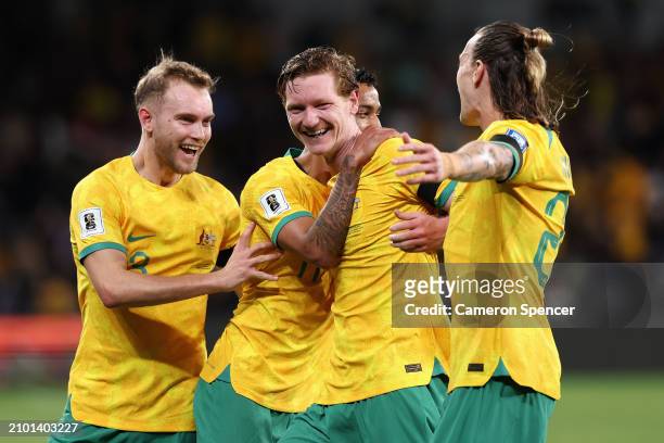 Kye Rowles of Australia celebrates scoring a goal with team mates during the FIFA World Cup 2026 Qualifier match between Australia Socceroos and...