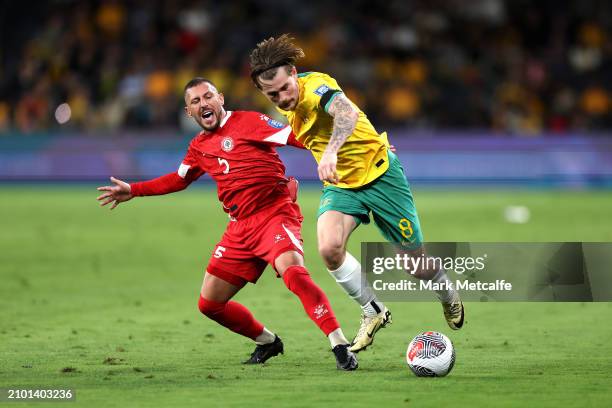 Connor Metcalfe of Australia takes on Nassar Nassar of Lebanon during the FIFA World Cup 2026 Qualifier match between Australia Socceroos and Lebanon...