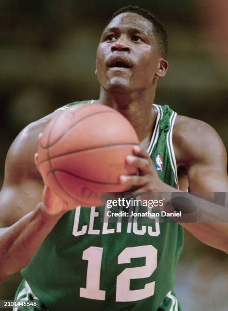 Dominique Wilkins, Small Forward for the Boston Celtics prepares to make a free throw shot during the NBA Central Division basketball game against...