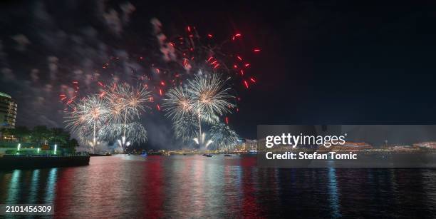 spectacular fireworks show over yas island waterfront in abu dhabi , the capital of united arab emirates - abu dhabi skyline night stock pictures, royalty-free photos & images