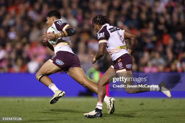 Selwyn Cobbo of the Broncos makes a break during the round three NRL match between Penrith Panthers and Brisbane Broncos at BlueBet Stadium on March...