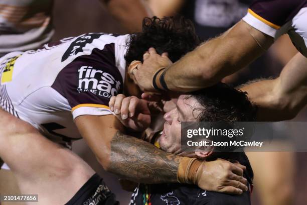 Liam Martin of the Panthers is tackled during the round three NRL match between Penrith Panthers and Brisbane Broncos at BlueBet Stadium on March 21,...