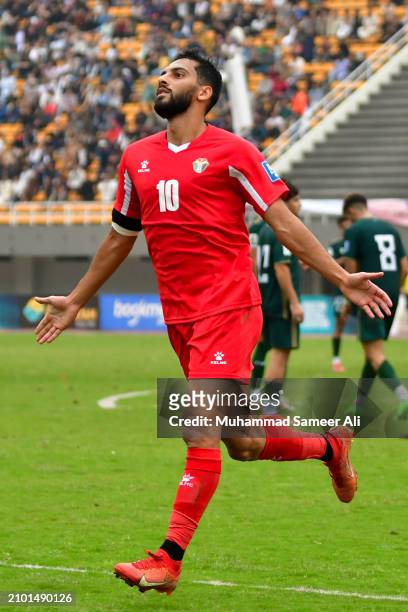 Mohammad Mousa Suleiman celebrates his team's third goal during the 2026 FIFA World Cup Qualifiers second round Group G match between Pakistan and...