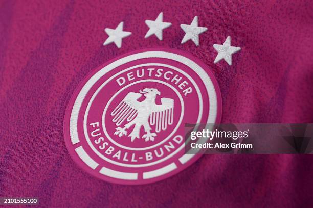 Detailed view of the DFB logo on the new pink away jersey during a press conference of the German national soccer team at DFB-Campus on March 21,...