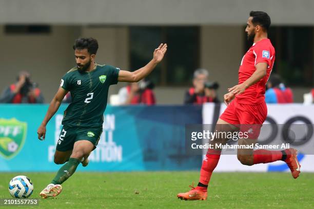 Muhammad Umar Hayat of team Pakistan aims a kick during the 2026 FIFA World Cup Qualifiers second round Group G match between Pakistan and Jordan at...
