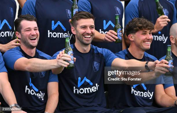 Durham players Ollie Robinson Mark Wood and Paul Coughlin share a joke as they hold bottles of Heineken 0% beer during the Durham CCC photocall ahead...