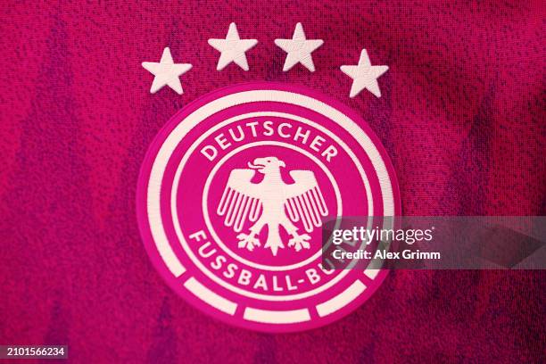 Detailed view of the DFB logo on the new pink away jersey during a press conference of the German national soccer team at DFB-Campus on March 21,...