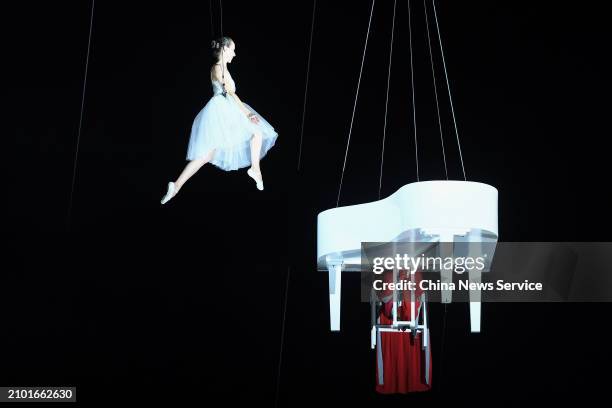 Light and shadow performance by Italy-based Festi Group is staged during the opening ceremony of the Shenzhen-Milan Lifestyle Week on March 19, 2024...