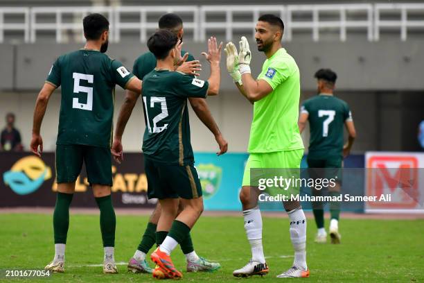 Yousuf Ejaz Butt of team Pakistan being appreciated by teammates for saving a goal during the 2026 FIFA World Cup Qualifiers second round Group G...