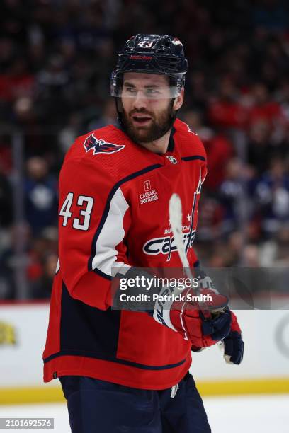 Tom Wilson of the Washington Capitals reacts against the Toronto Maple Leafs during the second period at Capital One Arena on March 20, 2024 in...