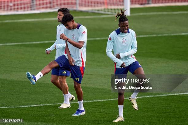 Lamine Yamal and Niko Williams of Spain joking during Spanish Football National Team Training session at Ciudad del futbol de Las Rozas on March 21,...