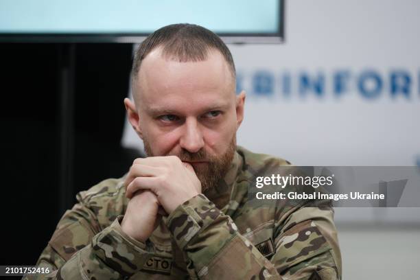 Operator, volunteer of the Freedom of Russia Legion, Oleksiy Baranovskyi (call sign 'Lyutik' listens during a press conference on March 21, 2024 in...