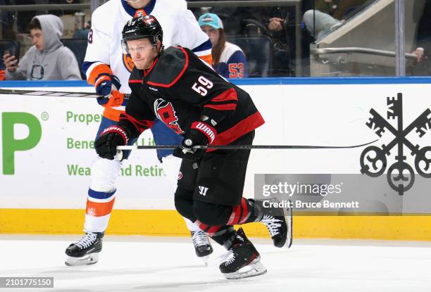 Jake Guentzel of the Carolina Hurricanes skates against the New York Islanders at UBS Arena on March 19, 2024 in Elmont, New York.