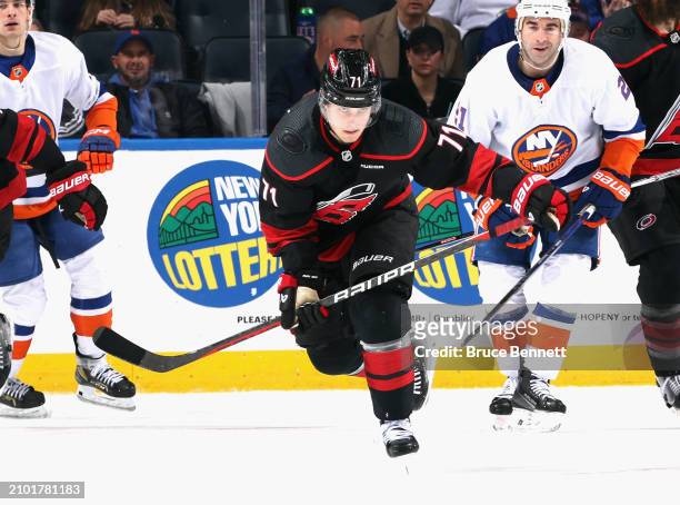 Jesper Fast of the Carolina Hurricanes skates against the New York Islanders at UBS Arena on March 19, 2024 in Elmont, New York.