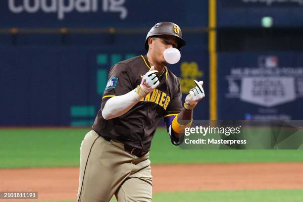 Manny Machado of the San Diego Padres celebrates hitting a three run home run in the 9th inning during the 2024 Seoul Series game between San Diego...