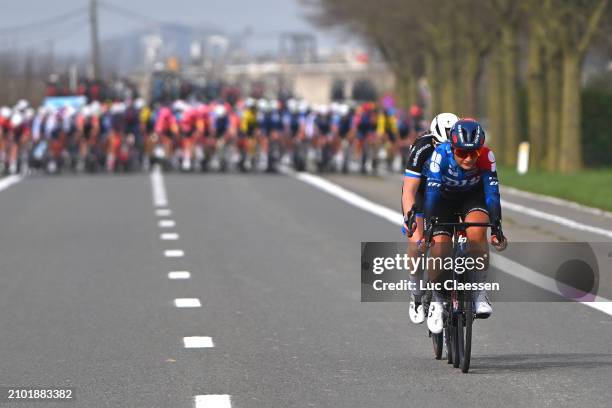 Lisa Van Helvoirt of The Netherlands and VolkerWessels Women's Pro Cycling Team and Alessia Vigilia of Italy and Team FDJ - SUEZ attack during the...