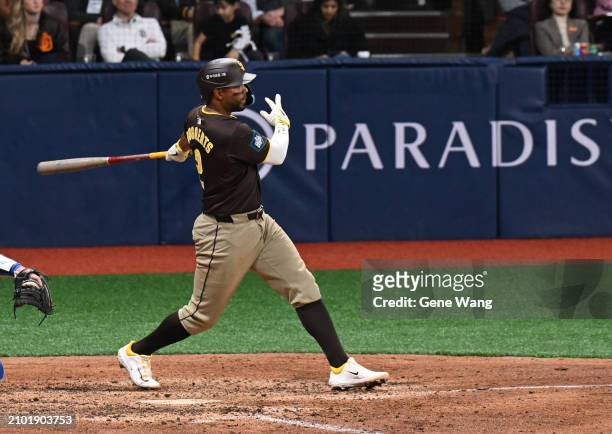 Xander Bogaerts of San Diego Padres hits a single in the top of the third inning during the 2024 Seoul Series game between Los Angeles Dodgers and...