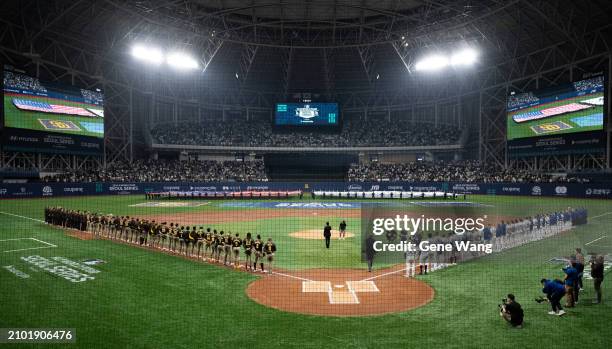 Team Los Angeles Dodgers and San Diego line up singing national anthem prior to the 2024 Seoul Series game between Los Angeles Dodgers and San Diego...