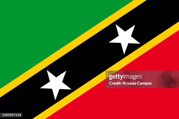 flag of saint kitts and nevis - san cristobal fotografías e imágenes de stock