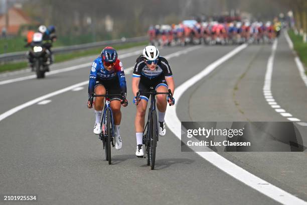 Lisa Van Helvoirt of The Netherlands and VolkerWessels Women's Pro Cycling Team and Alessia Vigilia of Italy and Team FDJ - SUEZ attack during the...