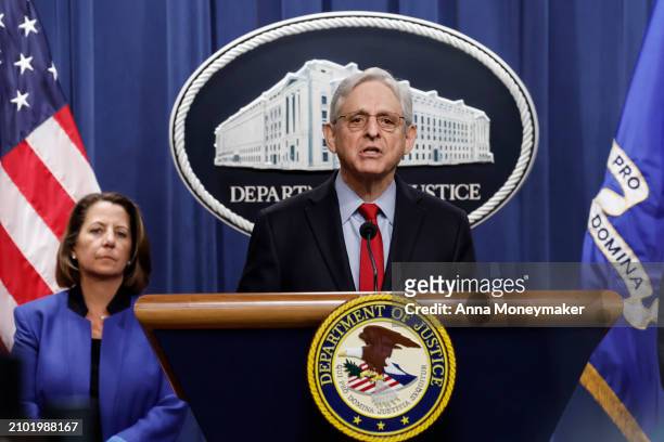 Attorney General Merrick Garland speaks alongside Deputy Attorney General Lisa Monaco during a news conference at the Department of Justice Building...