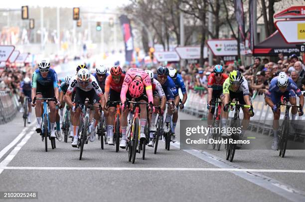 Dorian Godon of France and Team Decathlon-AG2R La Mondiale, Emils Liepins of Latvia and Team DSM-Firmenich, stage winner Marijn van den Berg of The...