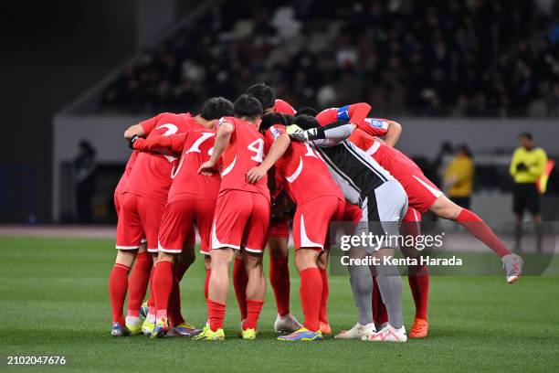 Players of Japan form a huddle prior to the FIFA World Cup Asian 2nd qualifier Group B between Japan and North Korea at National Stadium on March 21,...