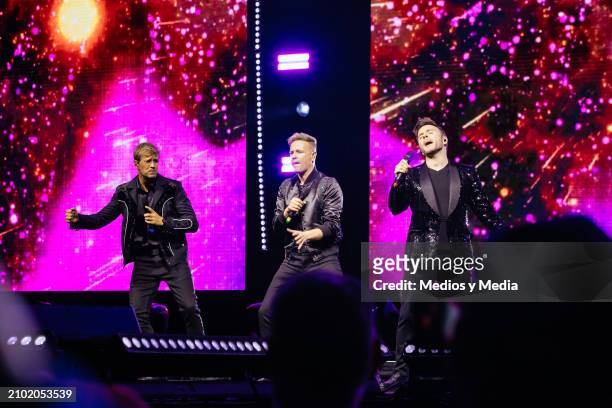 Nicky Byrne, Kian Egan, Shane Filan of Westlife band, perform during a concert as part of The Wild Dreams Tour at Arena Monterrey on March 20, 2024...