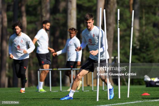 Matteo Gabbia of AC Milan in action during an AC Milan Training Session at Milanello on March 21, 2024 in Cairate, Italy.