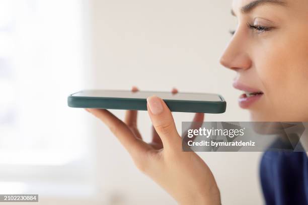 woman talking on phone - sound recording equipment stock pictures, royalty-free photos & images