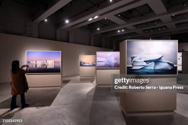 Visitors admires the masterpieces by Mexican photographer and artist Cristina Goettsch Mittermeier part of the exhibition "Cristina Mittermeier, La...