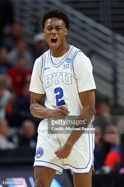 Jaxson Robinson of the Brigham Young Cougars reacts after a play against the Duquesne Dukes in the first round of the NCAA Men's Basketball...