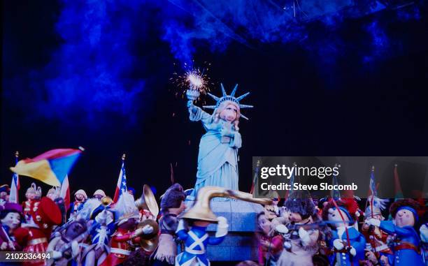 View of Muppet character Miss Piggy , dressed as the Statue of Liberty, among other Muppets, in a scene from the short film 'Jim Henson's...