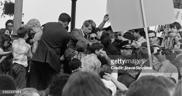 Senator and forrmer Attorney General Robert F Kennedy greets supporters during a presidential campaign rally on Olvera Street at the El Pueblo de Los...